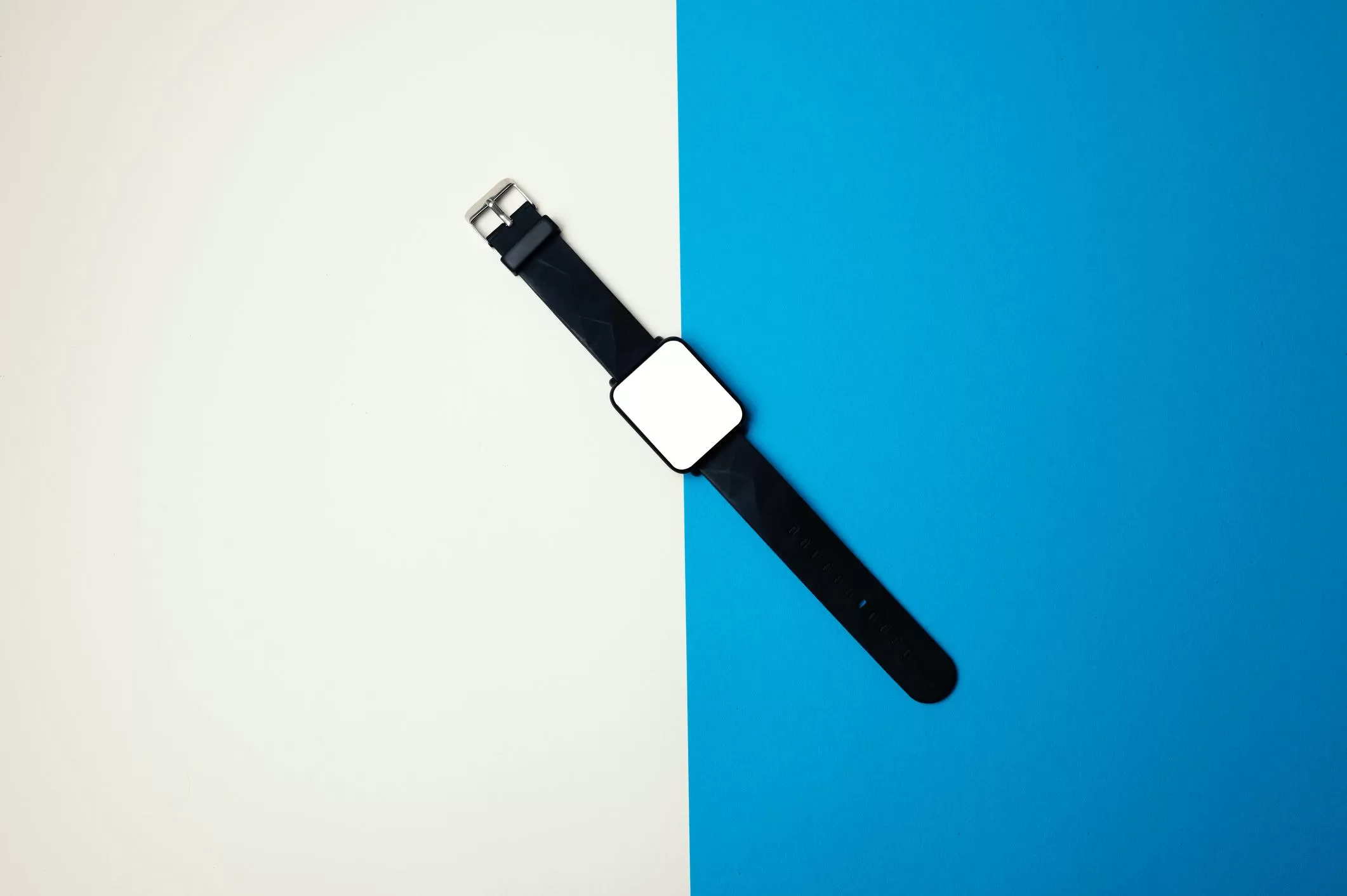 Modern smartwatch with a black strap centered on a clean background, showcasing a sleek and minimalist product design
